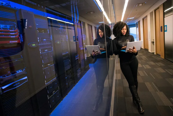 Engineer reviewing infrastructure in a data center