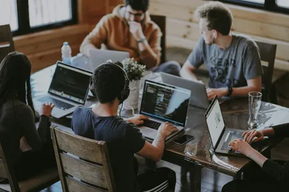 Development team collaborating around a table